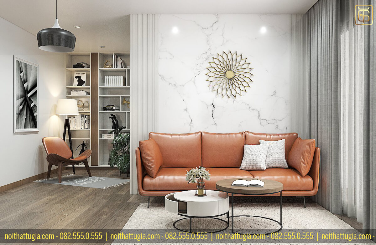 Bộ sofa là điểm nhấn cho toàn bộ không gian phòng khách căn hộ chung cư 65m2