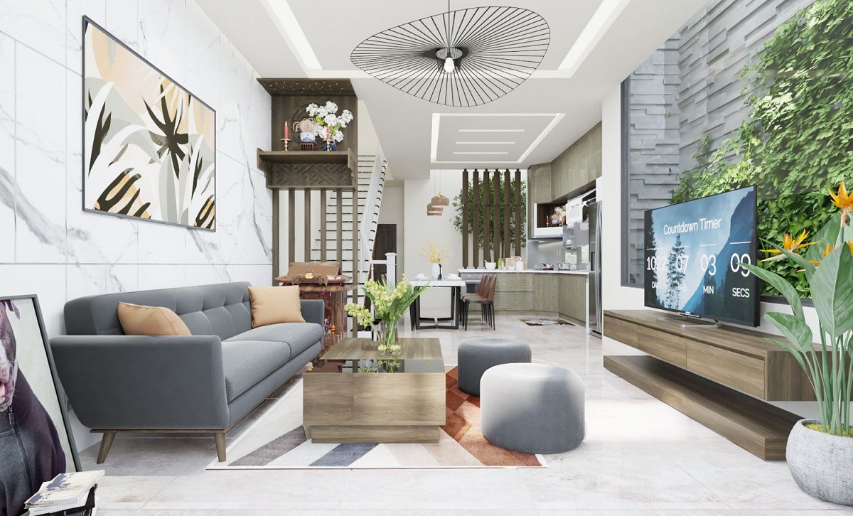 Bộ sofa kết hợp với bức tường màu trắng tạo sự rộng rãi, thông thoáng cho căn nhà