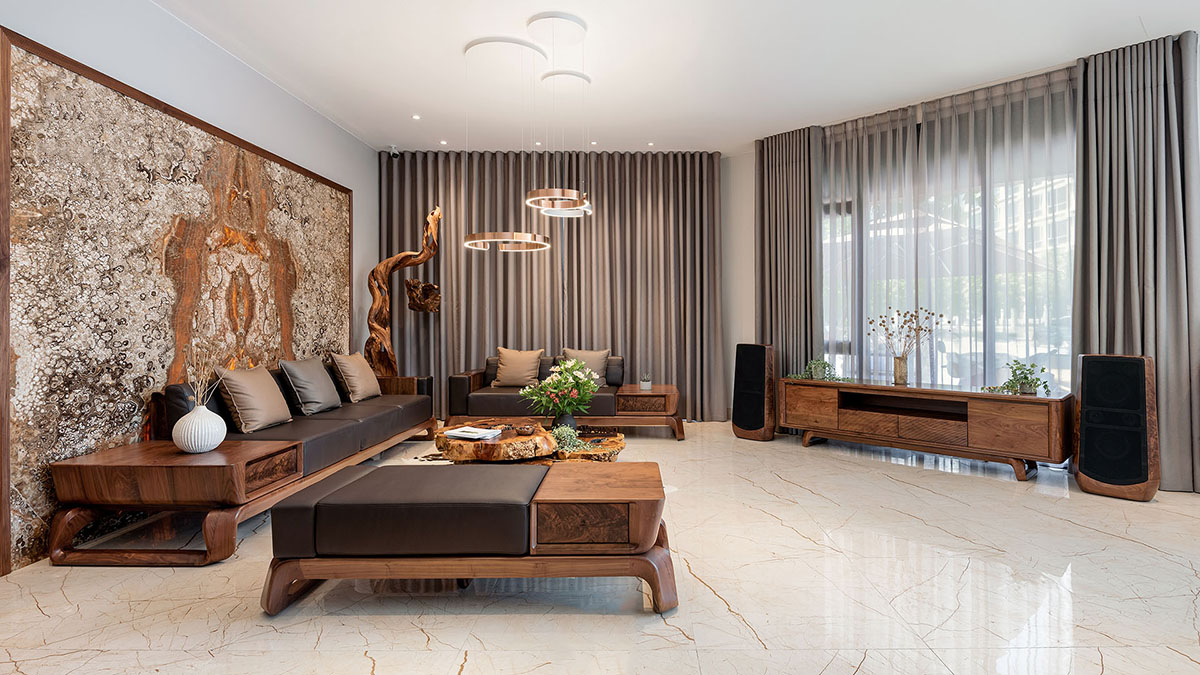 Sofa gỗ Óc chó màu nâu trầm phù hợp với nội thất chung phòng khách