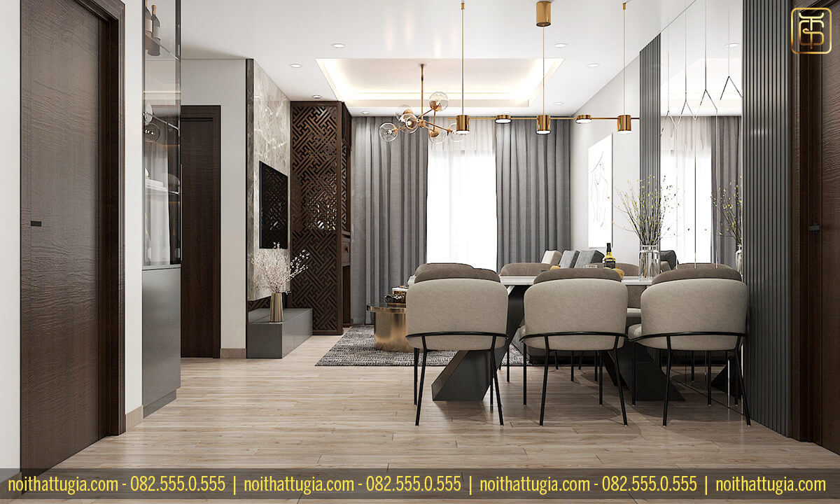 Không gian phòng khách cực kì sang trọng với vách ốp tường bằng gỗ kết hợp cùng đèn trang trí thả trần