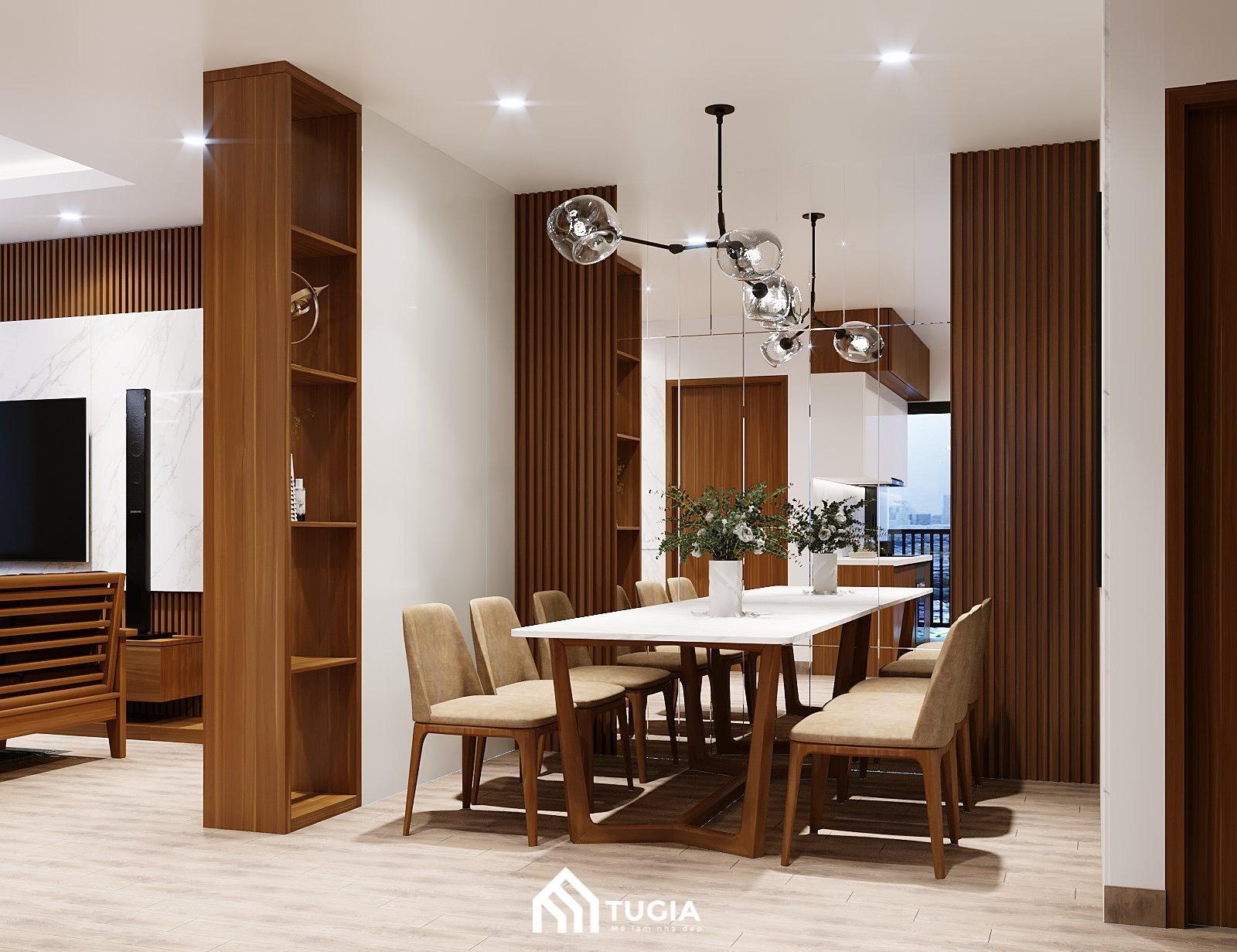 Phòng khách và khu vực bàn ăn được ngăn cách với nhau bởi một bức vách kết hợp kệ trang trí