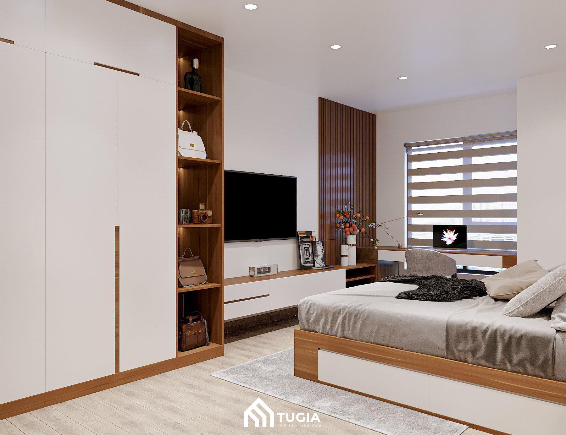 Kệ tivi kết hợp kệ để đồ giúp tăng diện tích lưu trữ cho phòng ngủ của vợ chồng Anh Nam