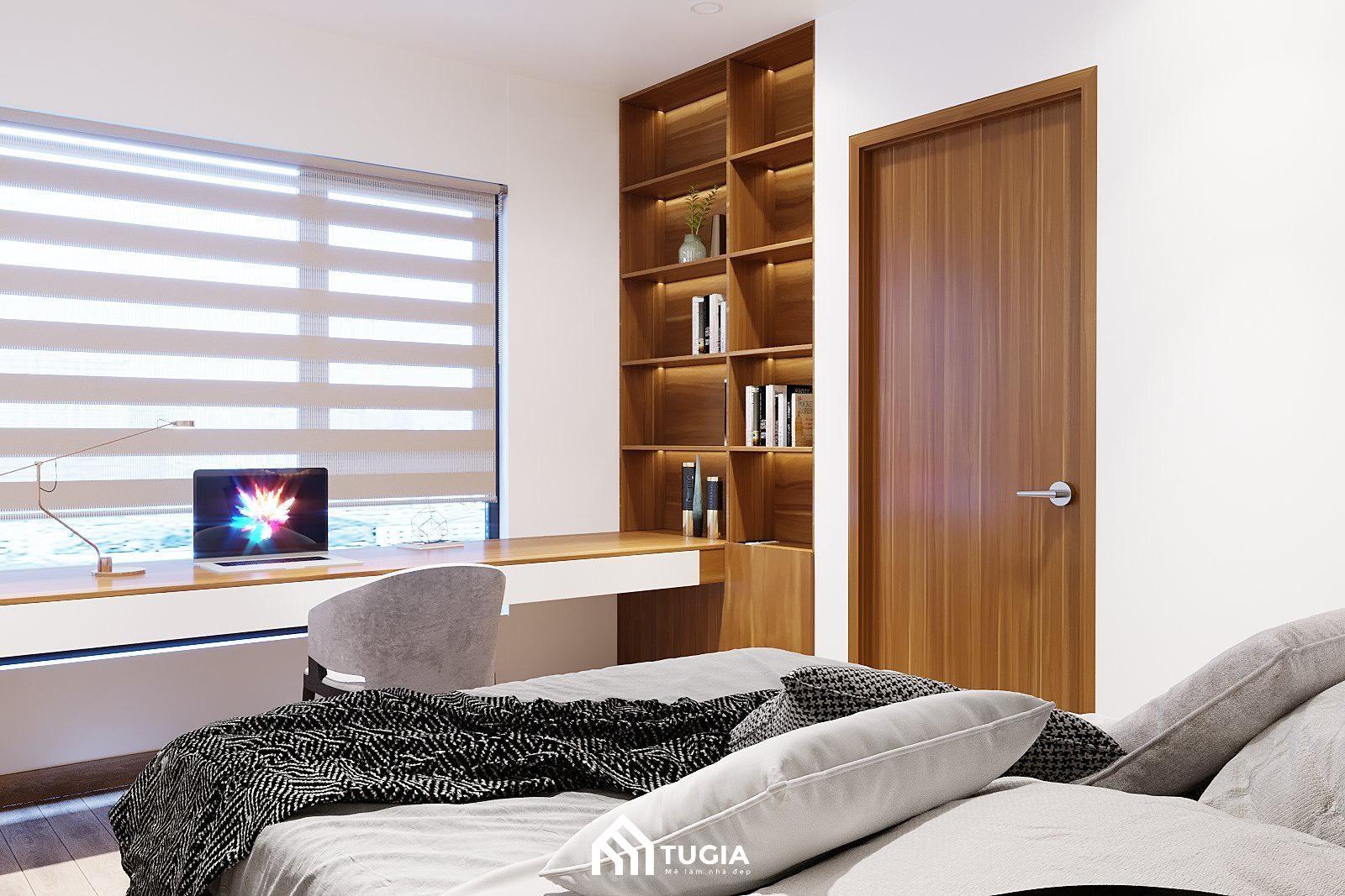 Bàn làm việc được hướng về phía cửa sổ để tận dụng tối đa ánh sáng tự nhiên