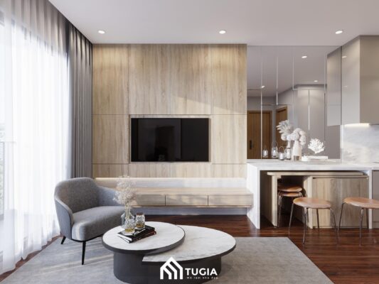 Phòng khách nhỏ gọn với sofa đơn sắc, bàn trà tối giản, kết hợp cùng kệ tivi tích hợp lưu trữ, tạo cảm giác thoáng đãng và gọn gàng