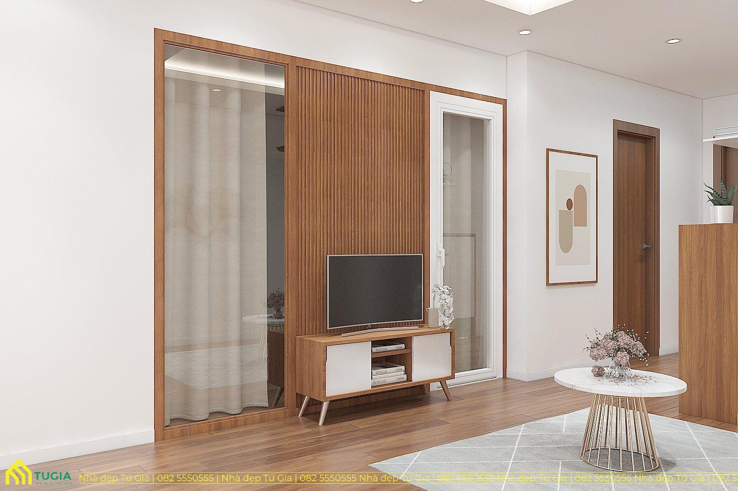 Kệ tivi được bố trí tối giản kết hợp cùng vách lam gỗ tạo điểm nhấn giúp bớt đi sự nhàm chán