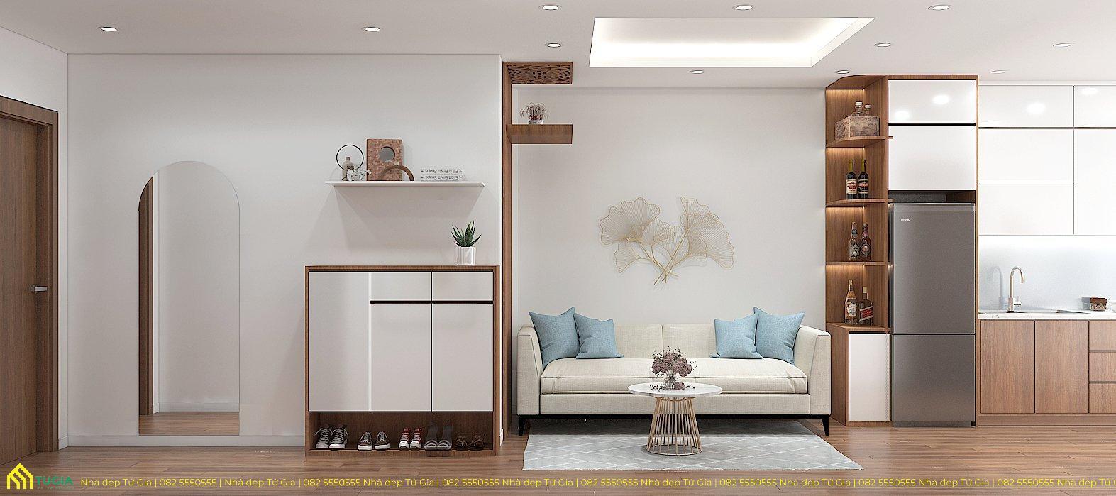 Không gian phòng khách được bố trí bằng bộ sofa chữ I để giúp tối ưu không gian
