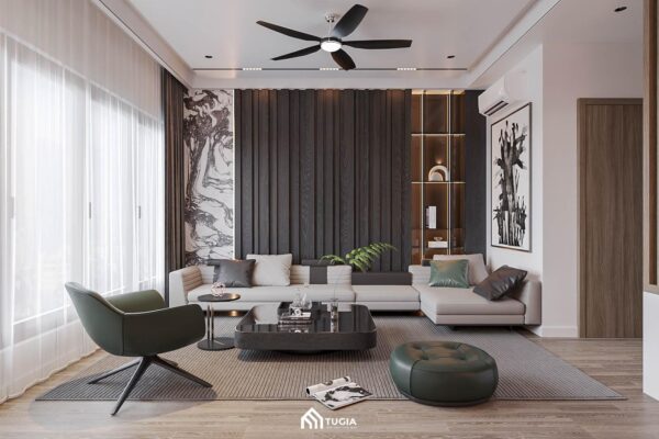 Bộ sofa màu xám nhạt phối cùng ghế đơn màu xanh rêu tạo điểm nhấn hài hòa, nổi bật giữa nền tường đen vân sọc cá tính