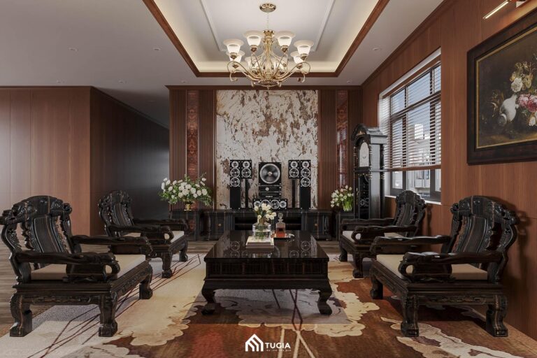 Điểm nhấn quan trọng nhất của phòng khách là bộ bàn ghế trường kỷ bằng gỗ tự nhiên