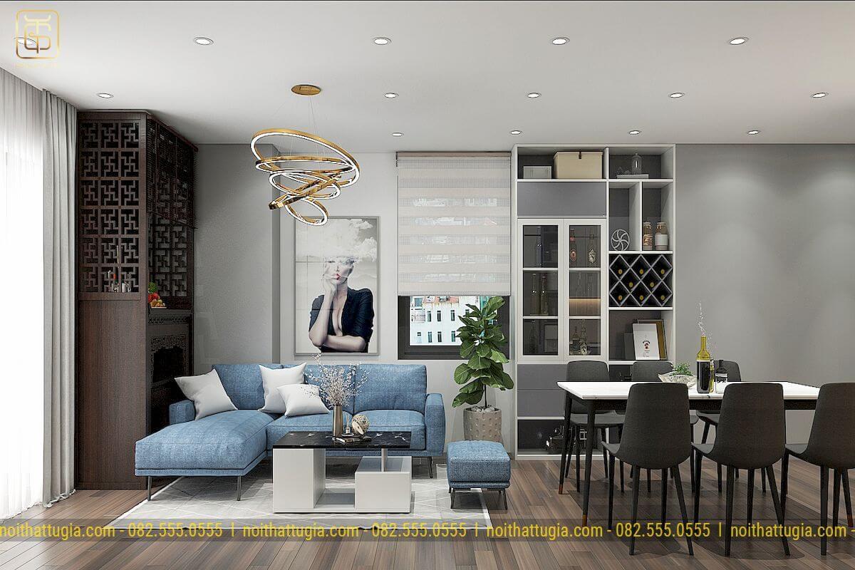 Sử dụng kệ gỗ treo tường sẽ giúp tạo điểm nhấn nổi bật cho toàn bộ không gian phòng khách chung cư