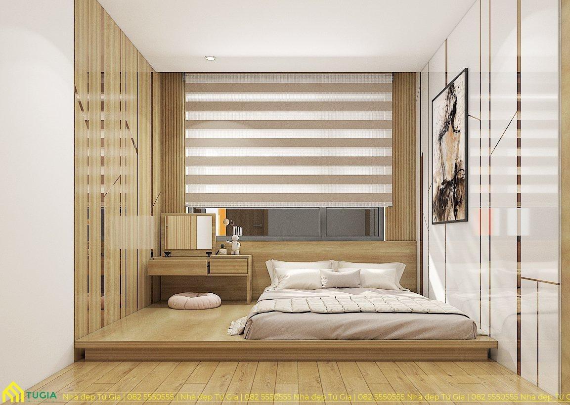 Phòng ngủ chính được thiết kế đơn giản với giường, bàn trang điểm, tủ quần áo