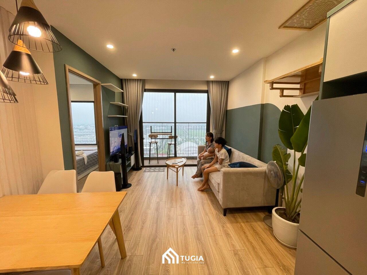 Thi công nội thất phòng khách căn hộ chung cư thường trú trọng đến các chi tiết trang tí như bàn trà, sofa