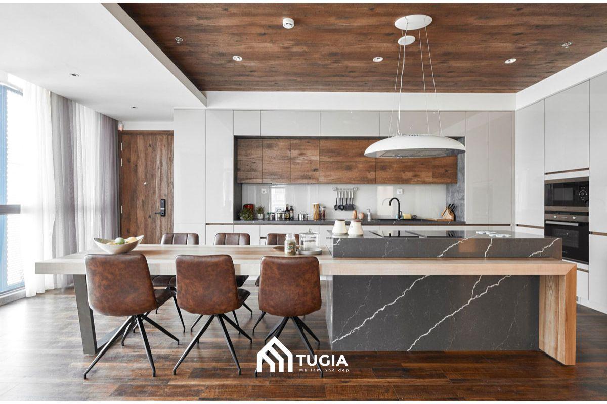 Bố trí đảo bếp kết hợp bàn ăn cho phòng bếp chung cư sẽ giúp tối ưu diện tích hơn so với việc tách riêng bàn ăn và đảo bếp