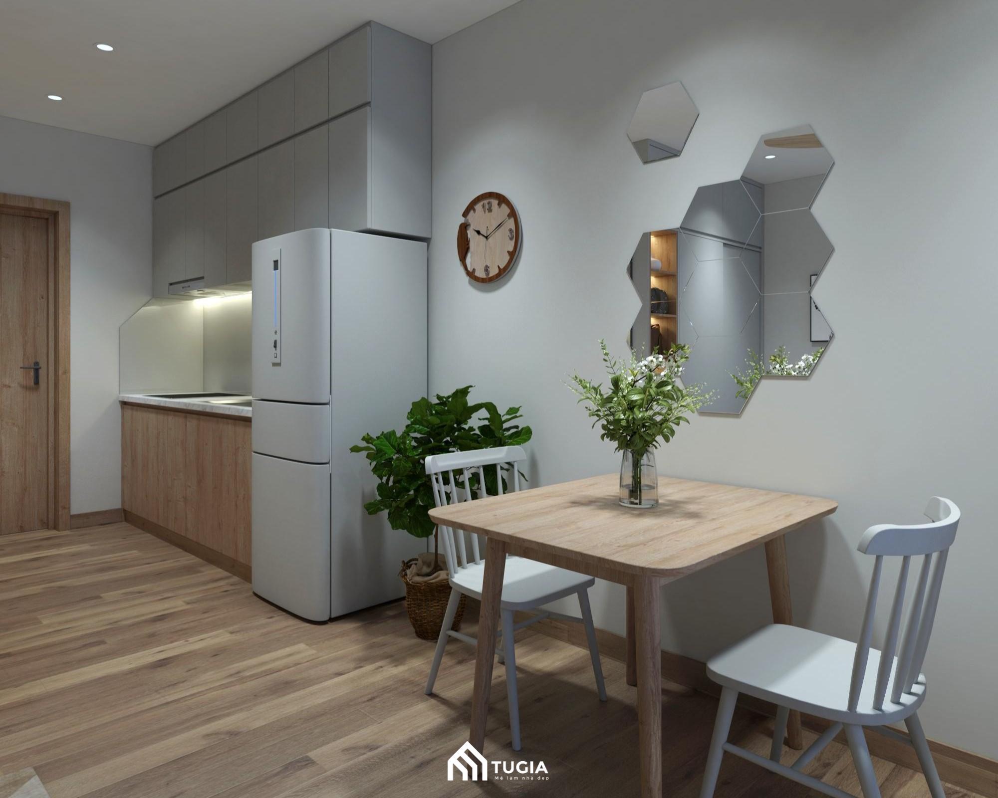 Bàn ăn gọn gàng đặt cạnh cửa sổ giúp tận dụng tối đa ánh sáng, đồng thời mang lại sự ấm cúng cho bữa cơm gia đình