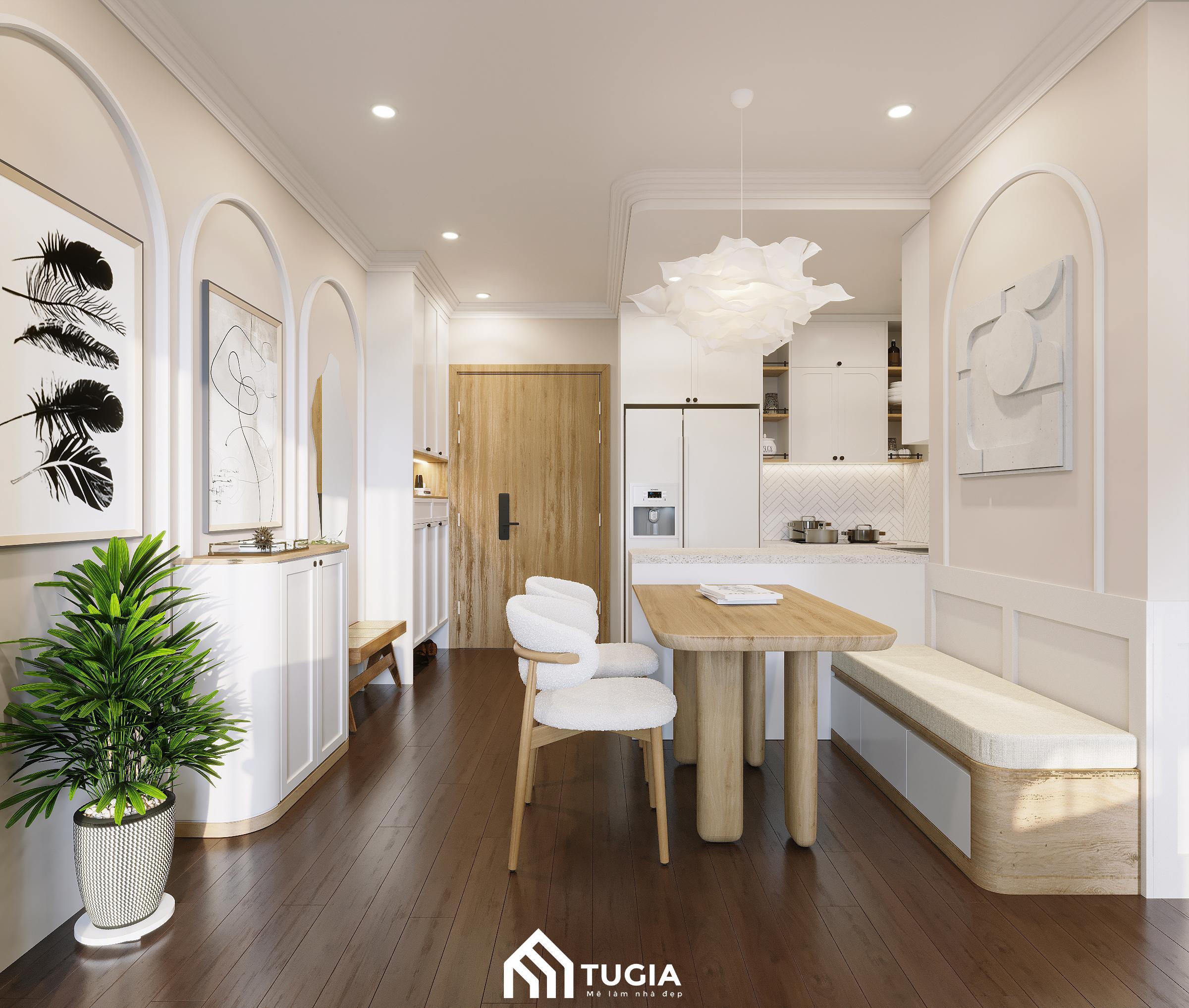 Không gian bếp ăn của căn hộ 65m2 nổi bật với thiết kế nhẹ nhàng, gam màu trắng, be kết hợp nội thất gỗ sáng màu sang trọng nhưng vẫn gần gũi
