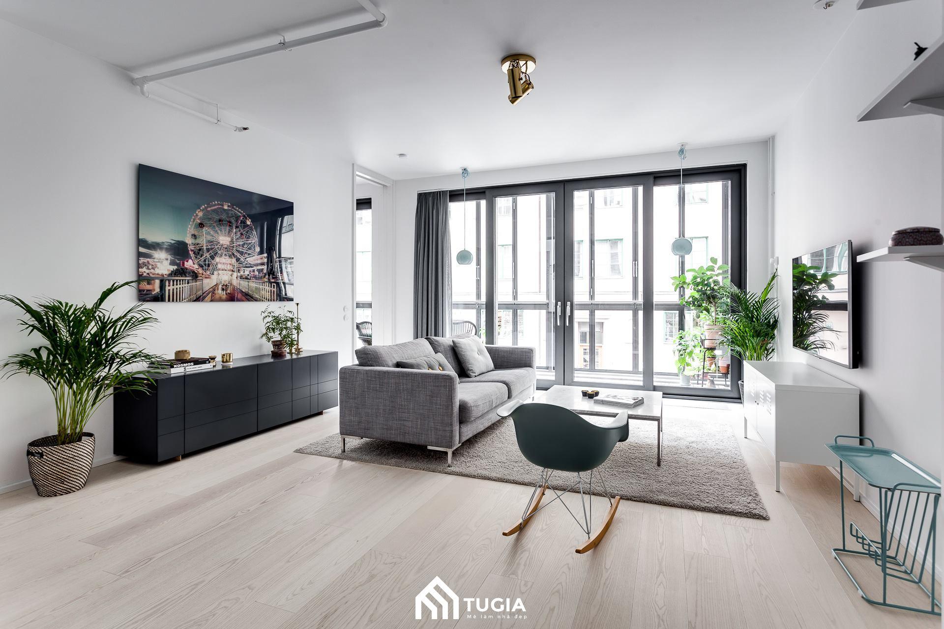 Mẫu thiết kế nội thất phòng khách chung cư 100m2 phong cách Scandinavian có cửa sổ cao kịch trần đón sáng
