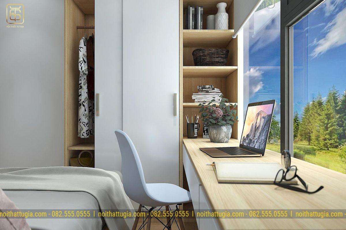 Bàn học được đặt cạnh cửa sổ để có thể nhận được nhiều ánh sáng tự nhiên là đặc trưng thường thấy trong căn hộ chung cư 45m2 có 2 phòng ngủ