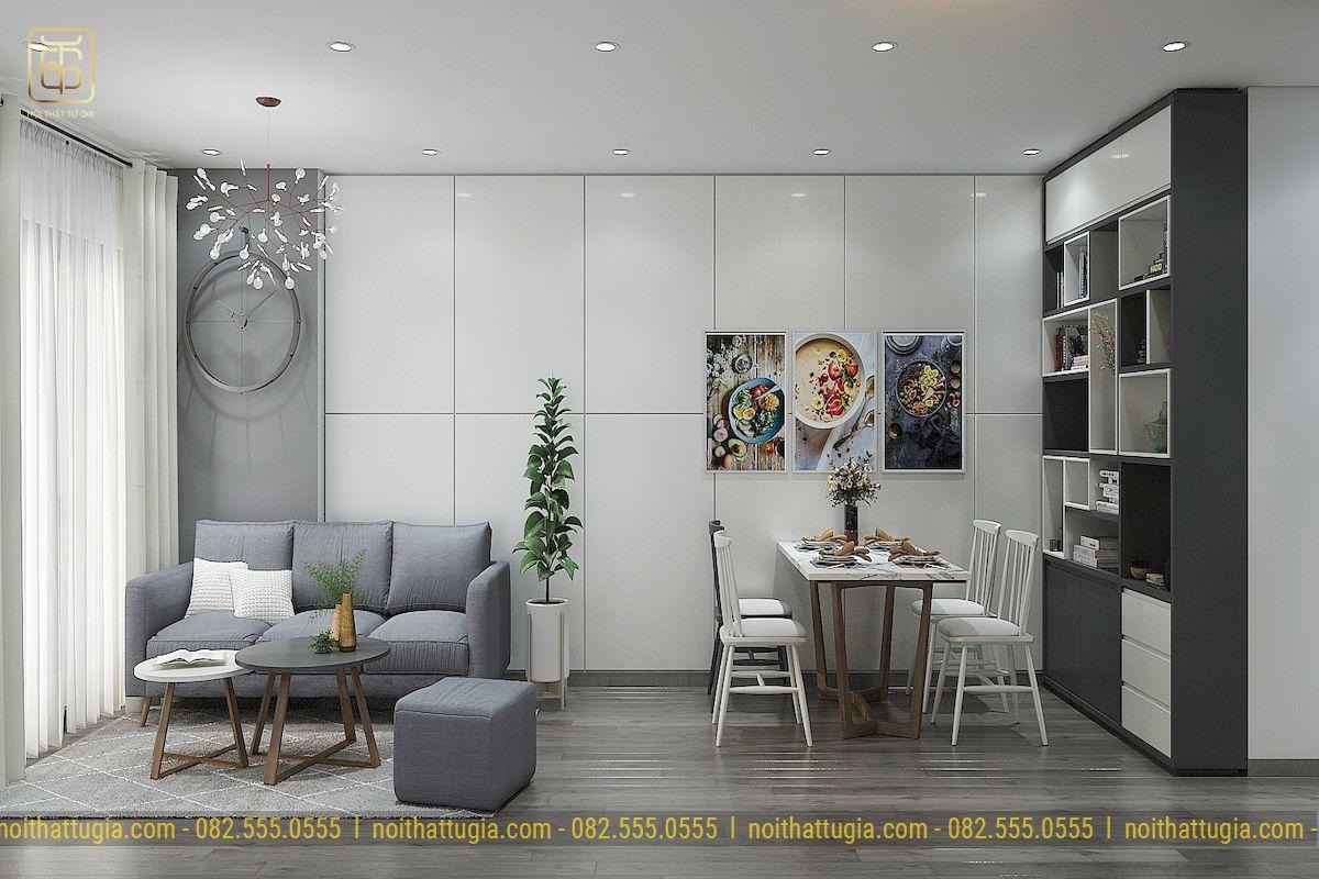 Không gian căn hộ bố trí phòng khách liền bếp liên thông với nhau tạo sự liền mạch, chiều sâu cho căn nhà