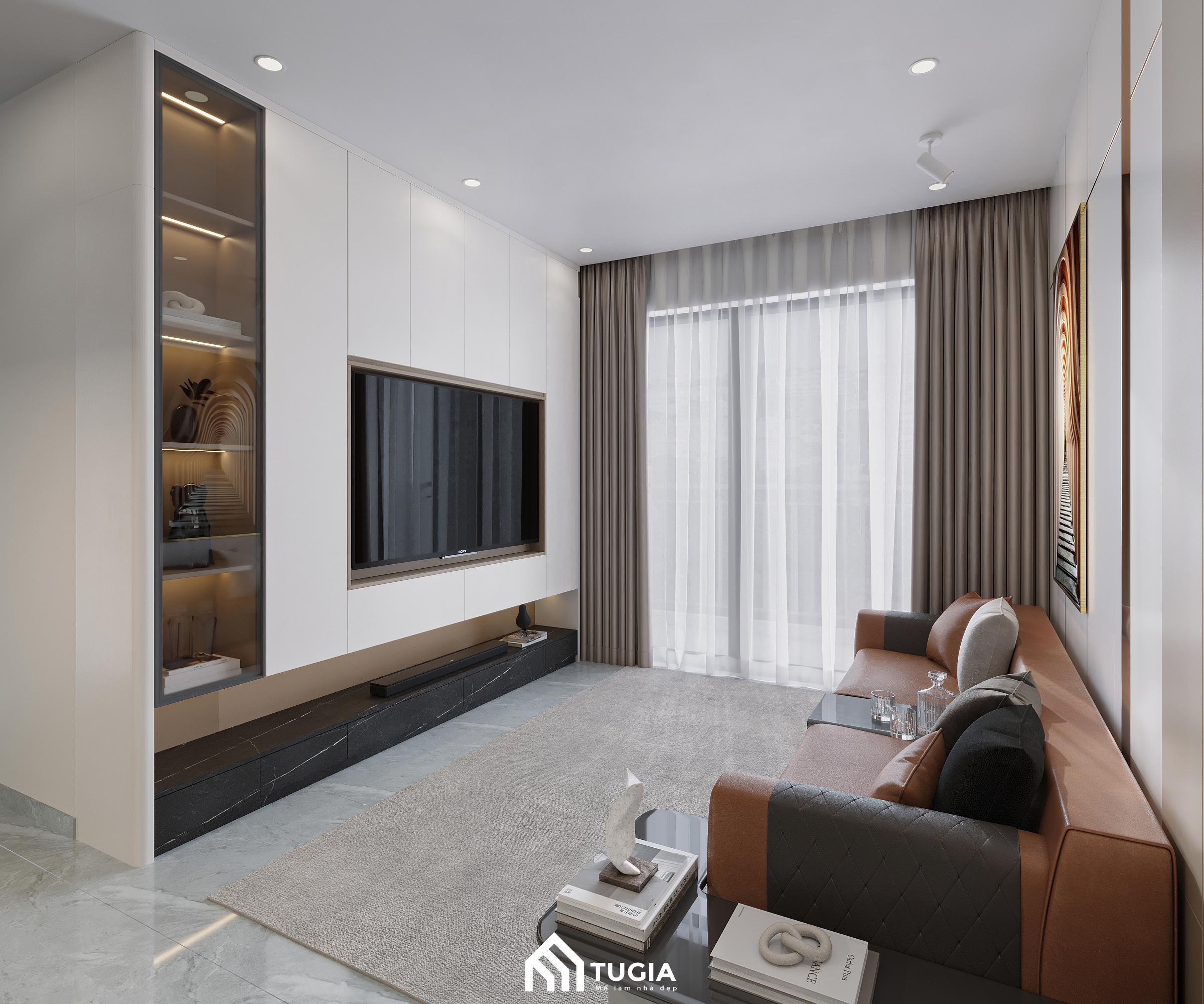 Phòng khách căn hộ với bộ sofa da cao cấp được đặt gần cửa ban công lớn