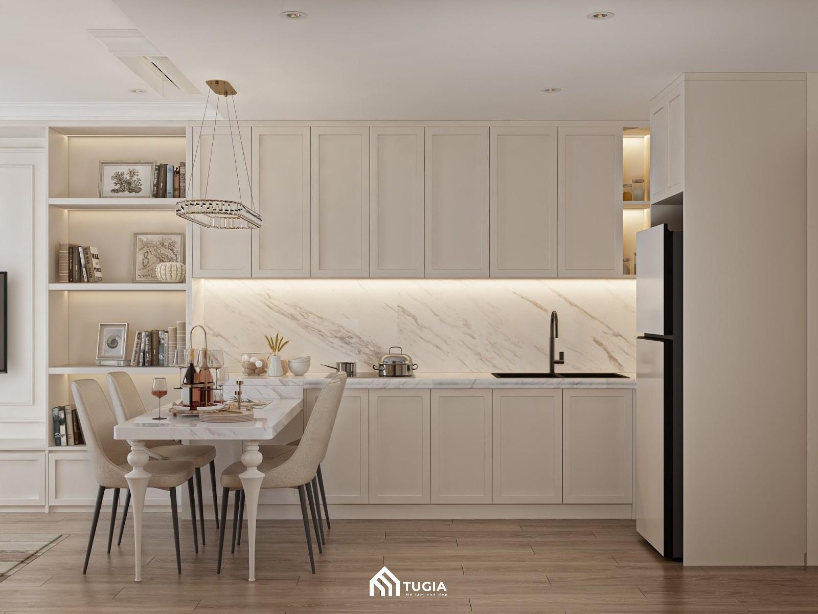 Không gian bếp được chăm chút kỹ lưỡng với bàn ăn mặt đá Marble sang trọng, hệ tủ bếp hiện đại và điểm nhấn là chiếc đèn thả trần duyên dáng phía trên bàn ăn