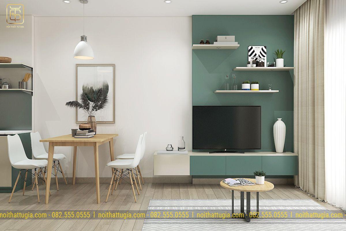 Phòng khách được thiết kế khá đơn giản nhằm tối ưu không gian, chiếc tivi màu đen tạo điểm nhấn cho căn phòng