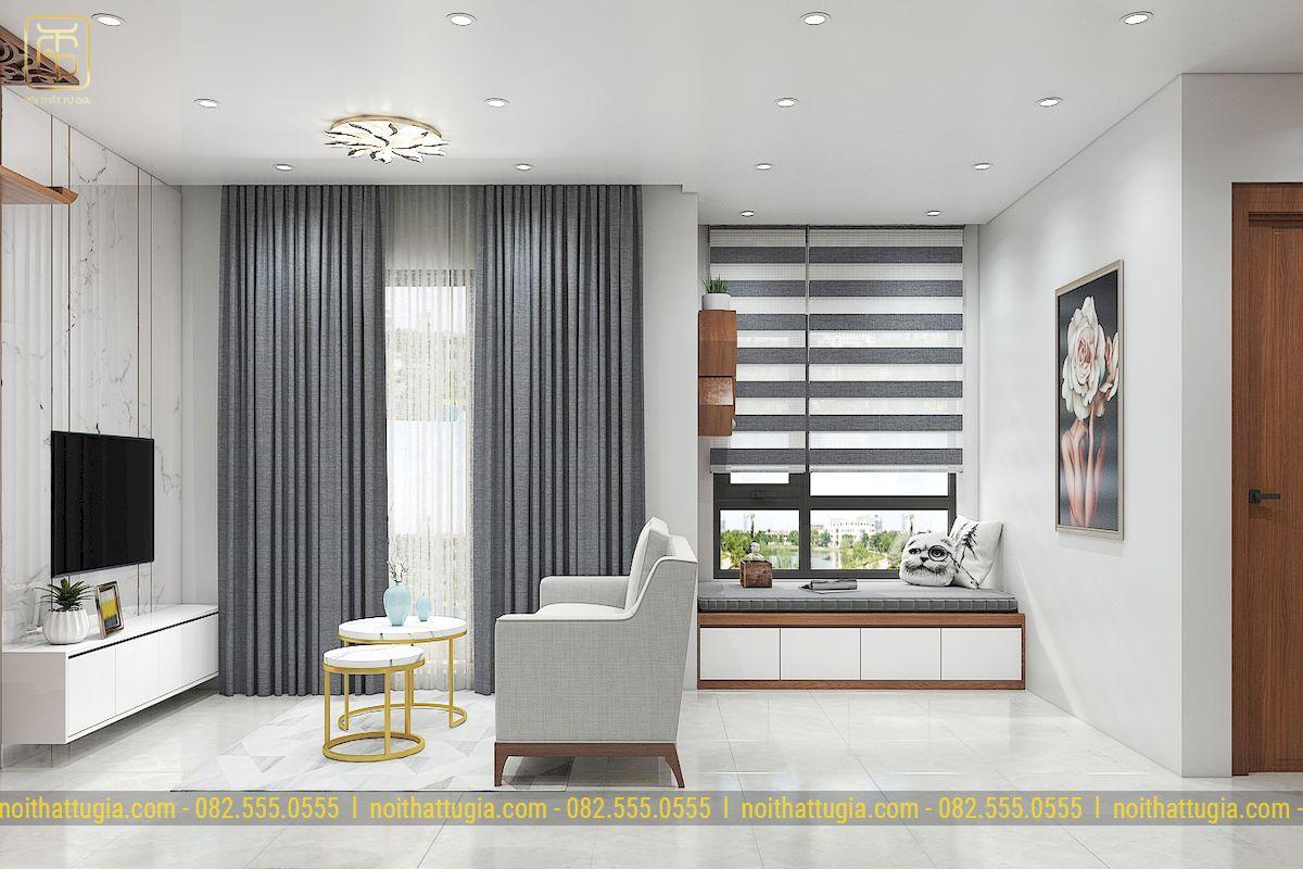 Đồ nội thất rất đơn với sofa đơn, kệ TV nhỏ và bục ngồi cạnh cửa sổ là đặc trưng thường thấy trong phong cách tối giản