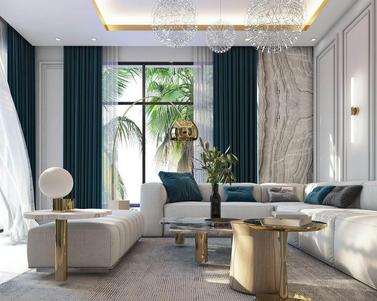 Sử dụng rèm hộp âm trần 2 lớp mã màu xanh đậm kèm lớp vải voan tạo điểm nhấn cho phòng khách