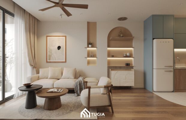Phòng khách được bố trí hài hòa với sofa vải mềm mại, bàn trà đơn giản và thảm lông tạo điểm nhấn, mang lại không gian tiếp khách thanh lịch