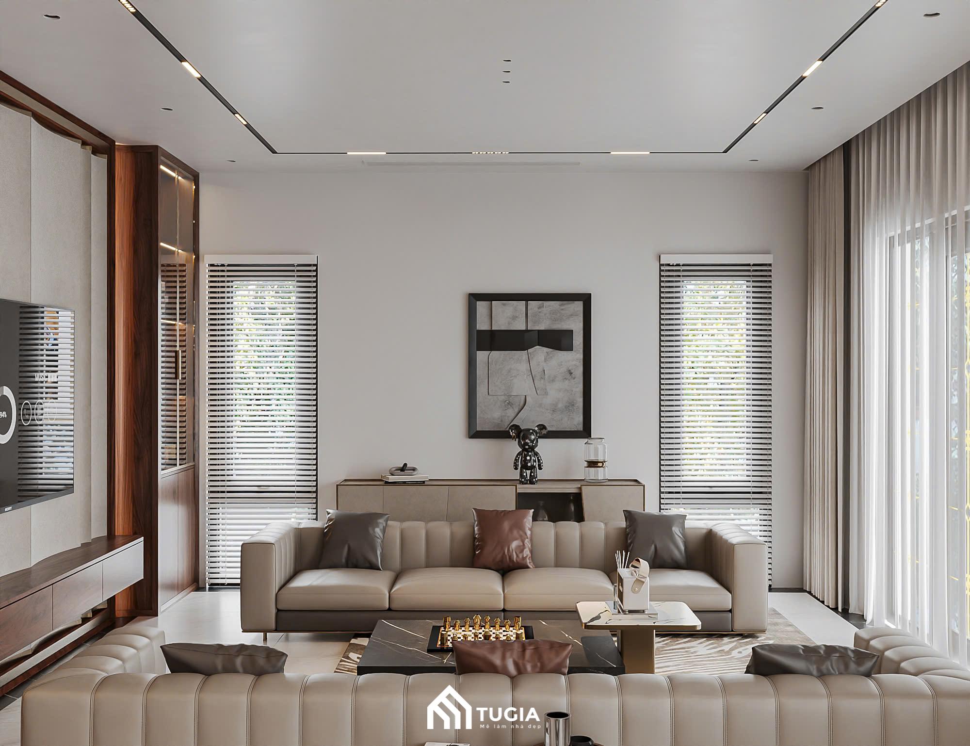 Phòng khách sử dụng layout đối xứng hai sofa dài, tạo cảm giác cân bằng và rất phù hợp với biệt thự sân vườn