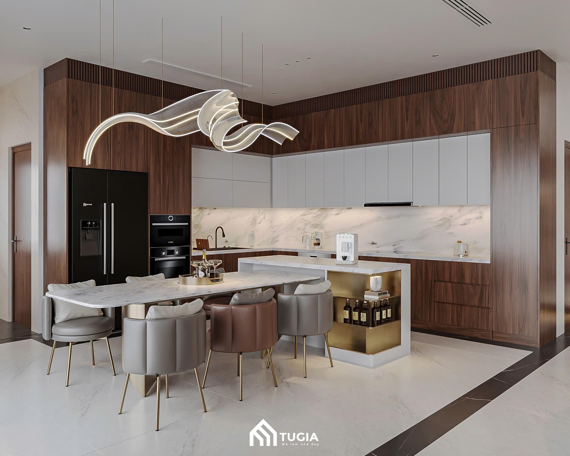 Hệ tủ gỗ óc chó sang trọng, mặt đá sáng dễ vệ sinh và những đường bo mềm mại tạo nên một tổng thể tinh tế