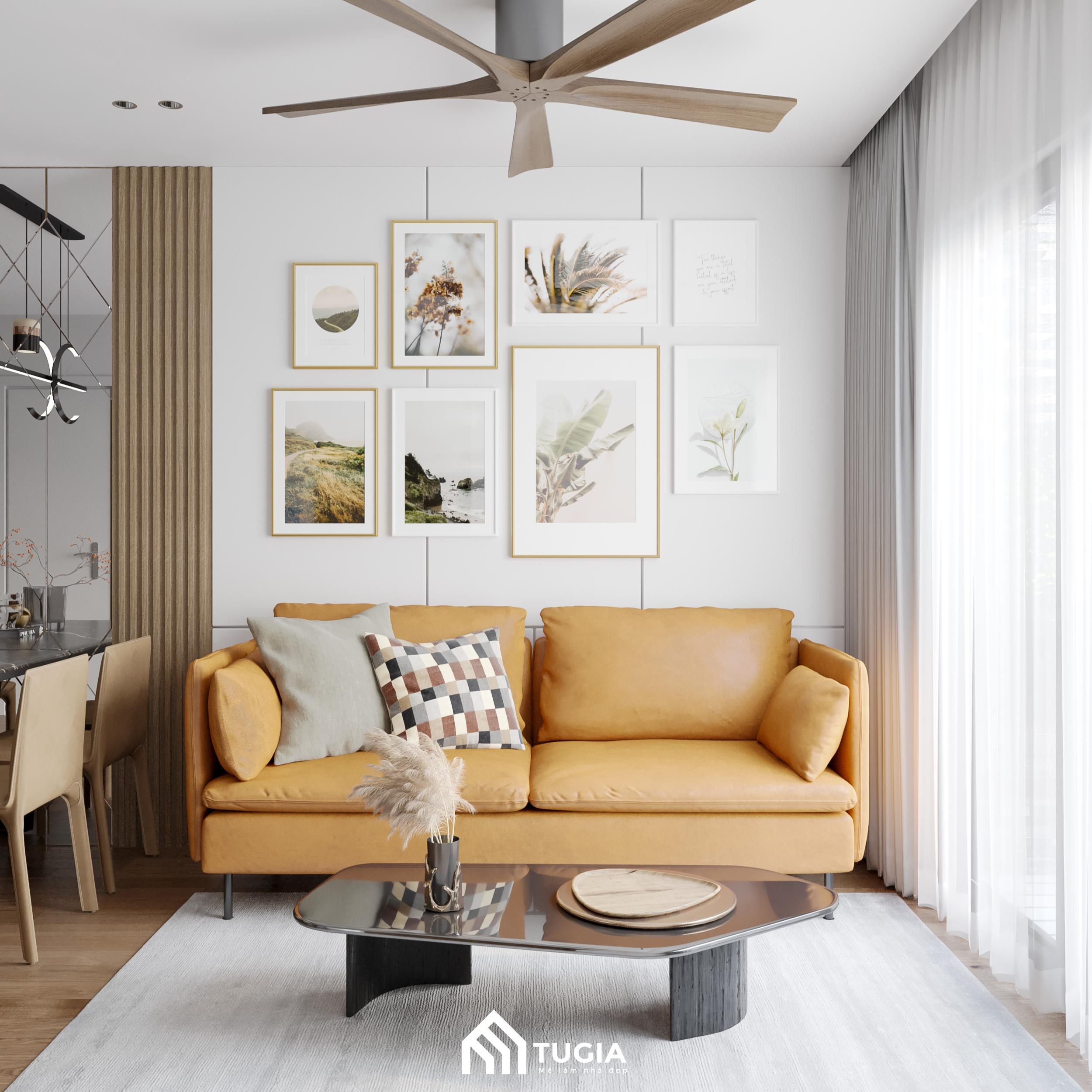 Bộ sofa và bàn trà kính nhỏ gọn, tiết kiệm diện tích mà vẫn đảm bảo tính thẩm mỹ cho không gian