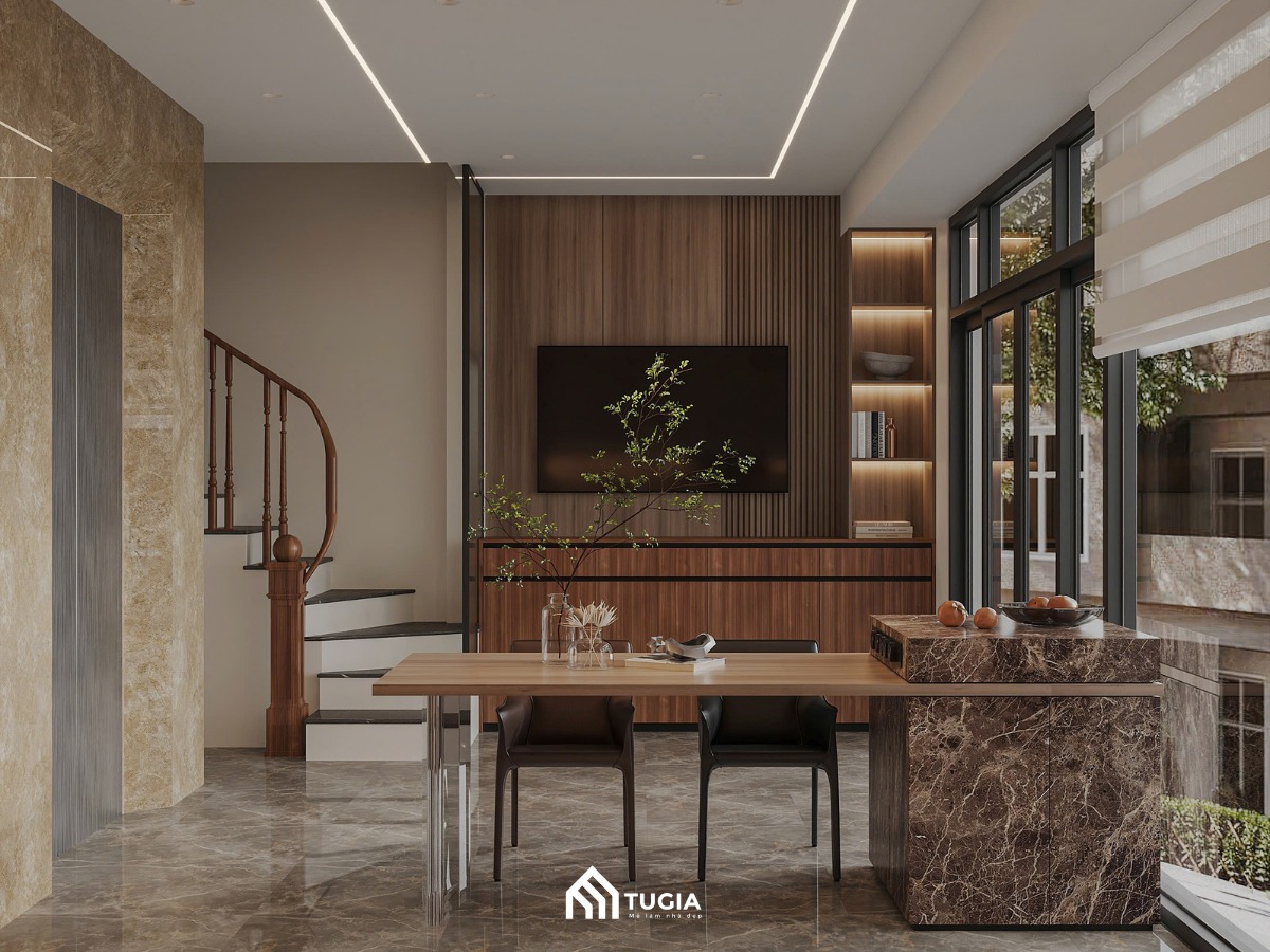 Bàn ăn được thiết kế liền với đảo bếp, vừa tiết kiệm diện tích vừa tăng tính kết nối khi nấu nướng