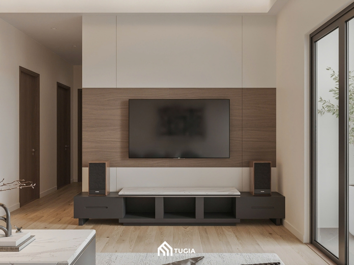 Không gian kệ tivi phòng khách chung cư 80m2 đẹp mắt với sự kết hợp hài hòa giữa gỗ công nghiệp và đá marble, cùng hệ thống loa giải trí