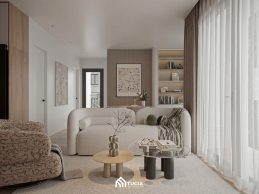 Bộ sofa bo cong mềm mại kết hợp bàn trà nhỏ tạo điểm nhấn tinh tế, trong khi hệ rèm hai lớp giúp tận dụng tối đa ánh sáng tự nhiên