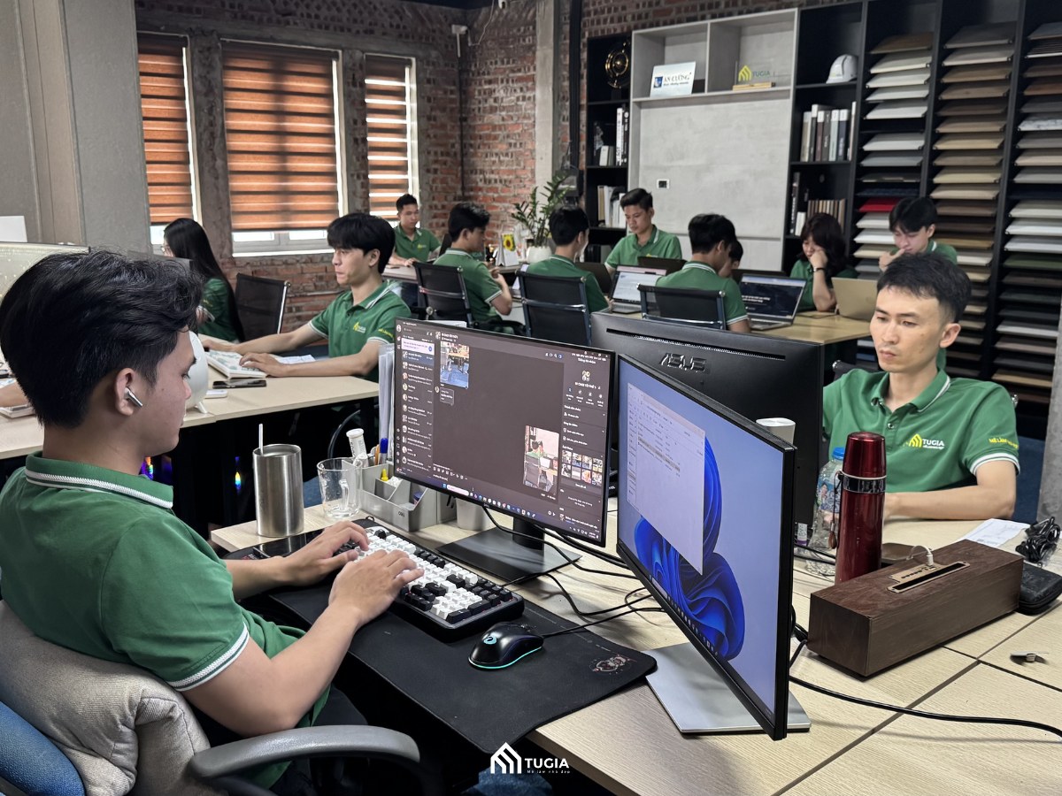 Đội ngũ kiến trúc sư và kỹ sư Nội Thất Tứ Gia đang tập trung làm việc chuyên nghiệp tại văn phòng thiết kế nội thất