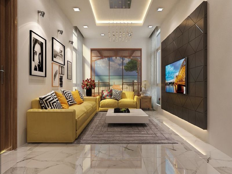 Bộ sofa màu vàng tạo điểm nhấn cho phòng khách