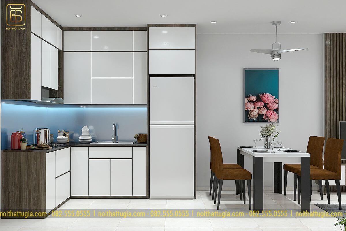 Lựa chọn tủ lạnh màu trắng cùng tone màu phủ melamin của tủ bếp tạo sự rộng rãi, sang trọng cho căn phòng