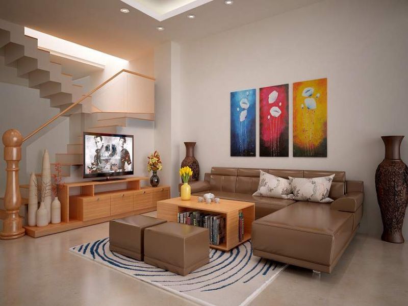 Phòng khách với 3 bức tranh màu sắc độc đáo treo tường tạo điểm nhấn ấn tượng
