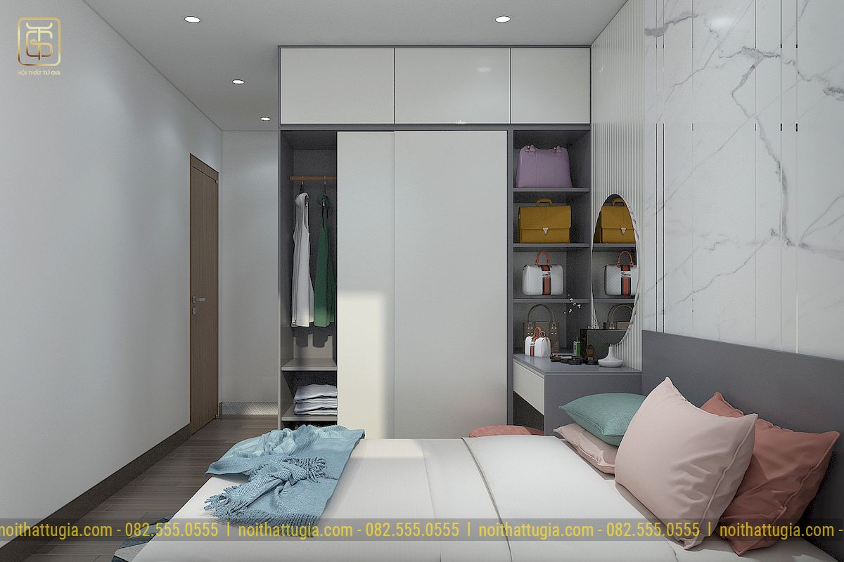 Phòng ngủ được thiết kế đơn giản tiện nghi với tủ quần áo kịch trần kết hợp bàn trang điểm tinh tế
