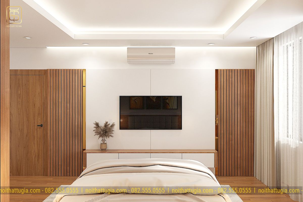 Phòng ngủ rộng rãi tiện nghi, điểm nhấn đặc biệt là cách sử dụng ốp tường bằng gỗ tinh tế