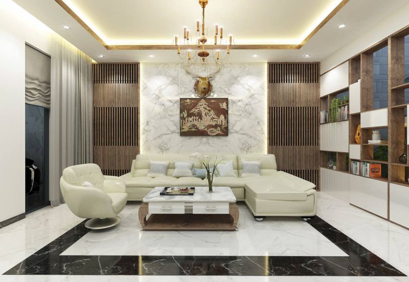 Thiết kế phòng khách tone màu trắng cùng với sự kết hợp của những chậu cây xanh mát mẻ, ấn tượng