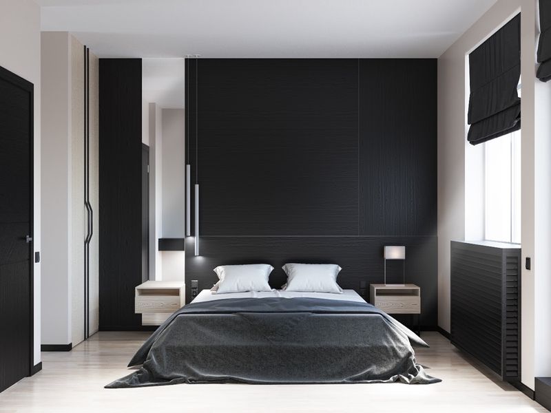 Không gian phòng ngủ được sơn tông màu đen kết hợp với hệ thống đèn led kết hợp với các loại decor dạng bóng giương