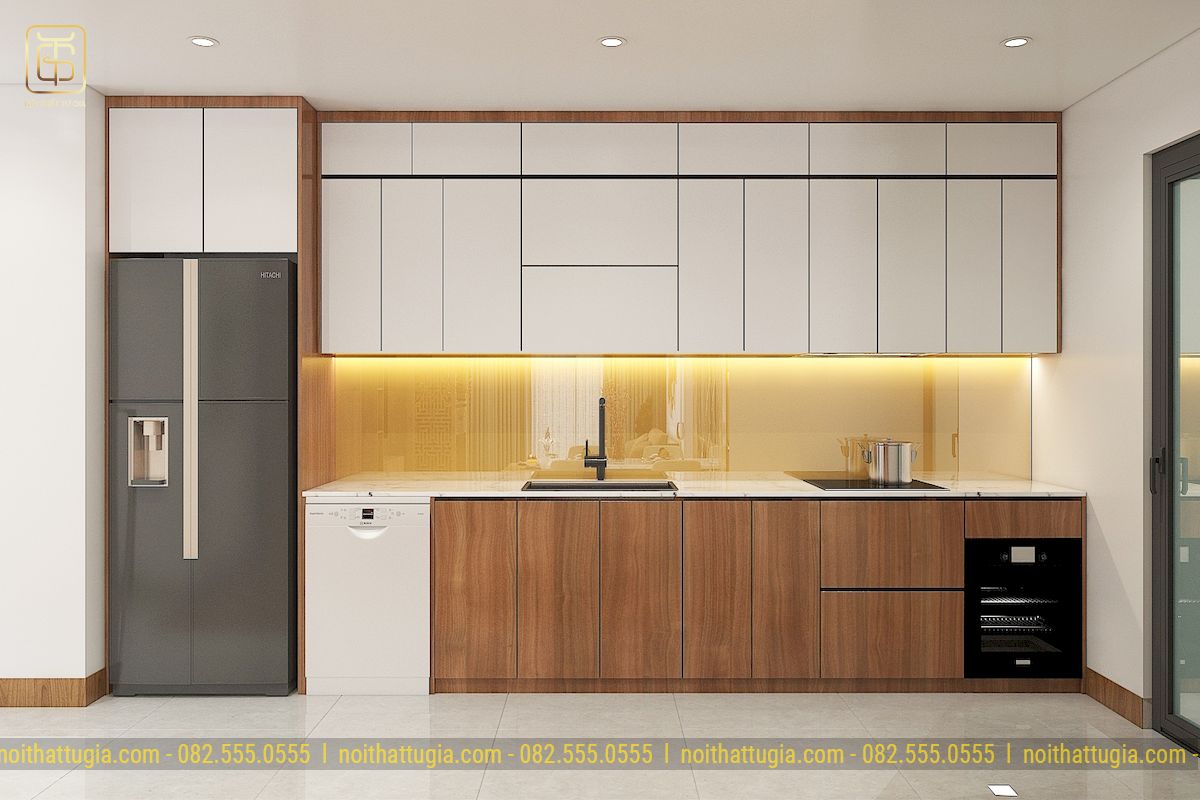 Phòng bếp với thiết kế hiện đại, tủ bếp khá dài và cao kịch trần đủ để chứa hết các đồ gia dụng trong căn bếp