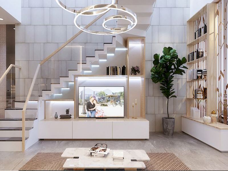 Vách kệ tivi đẹp cầu thang thiết kế ấn tượng tạo điểm nhấn cho tổng thể không gian phòng khách